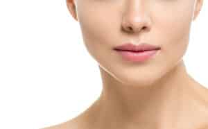 Cropped shot of a woman's nose after rhinoplasty recovery