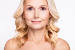 Woman smiling after laser peel treatment in Grand Rapids