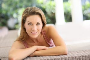 Woman with a smooth, youthful facial appearance after facelift surgery in Grand Rapids, MI
